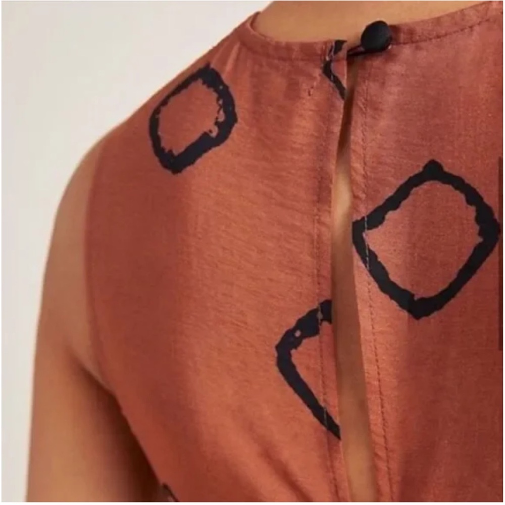 Anthropologie Rust Orange Geometric Twist-Halter Jumpsuit - Picture 4 of 8